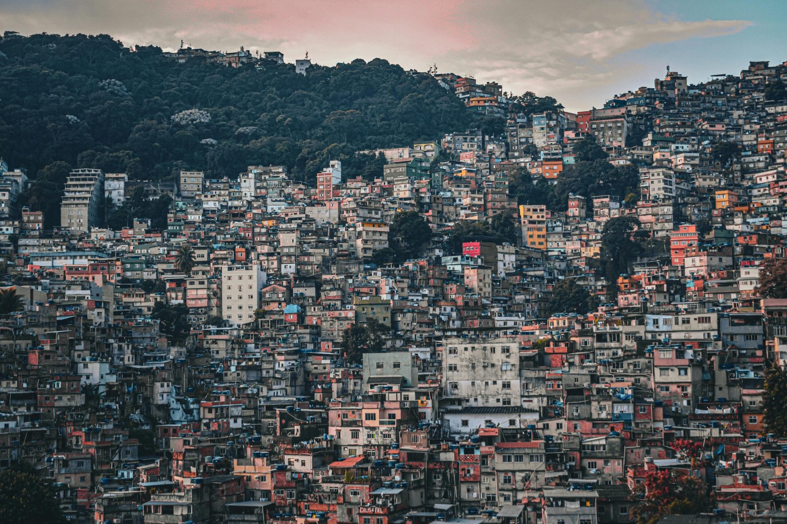 Aerial view of a densely populated favela in Rio de Janeiro, capturing urban density and cultural vibrancy.